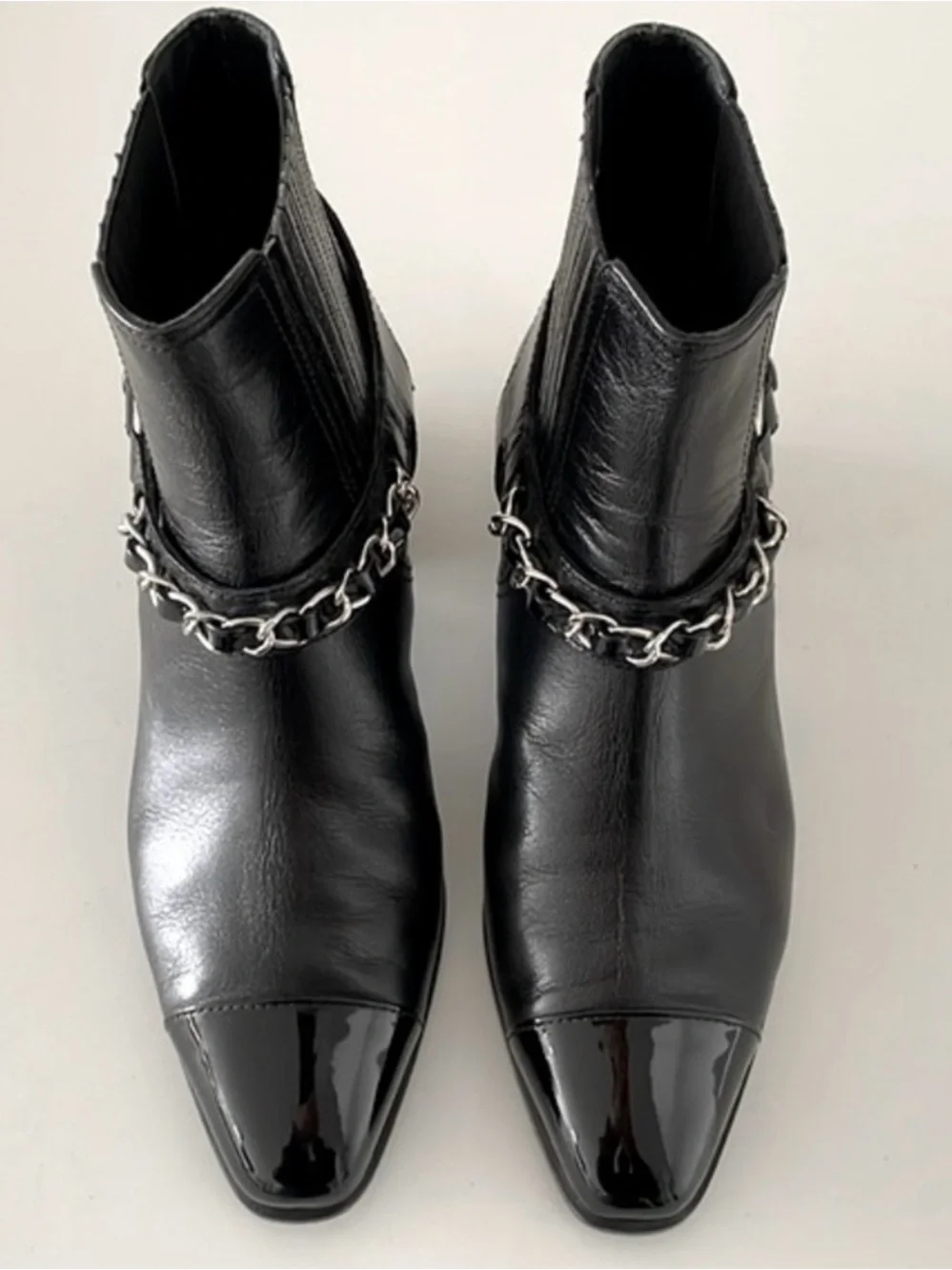 Chanel Black Leather Ankle Boots w/ Signature Toe Cap, Chain and CC Logo Charm